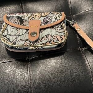 Dooney & Bourke DISNEY Parks Cruise Line Fantasy Flap Wristlet.          6” x 4”